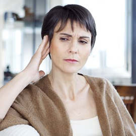 woman with tinnitus