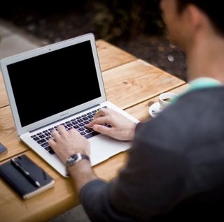 Person typing on a computer