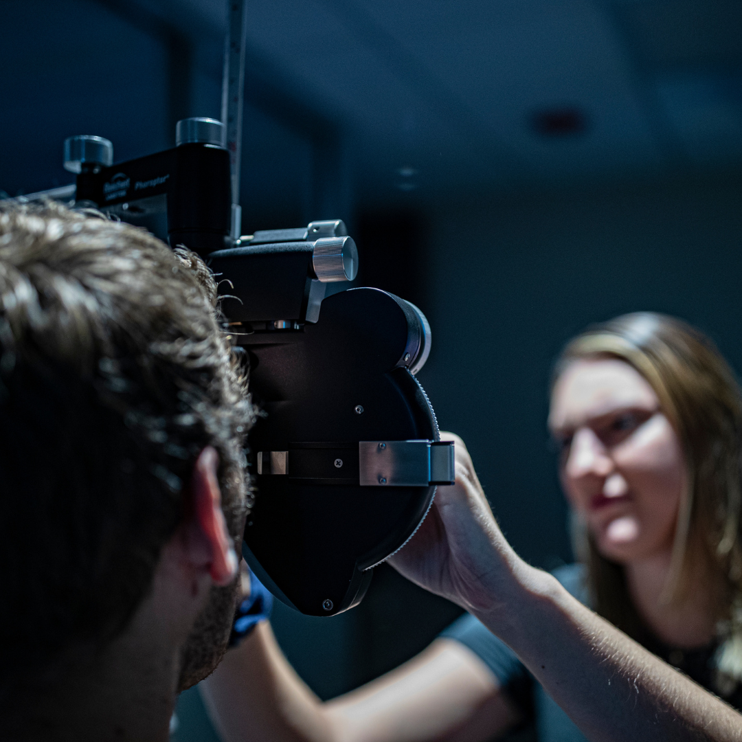 Doctor performing an eye exam