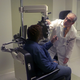 Dr, Nyman providing an eye exam