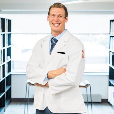 Fourth-year Doctor of Optometry student, Daniel Hoffman smiling at the camera 