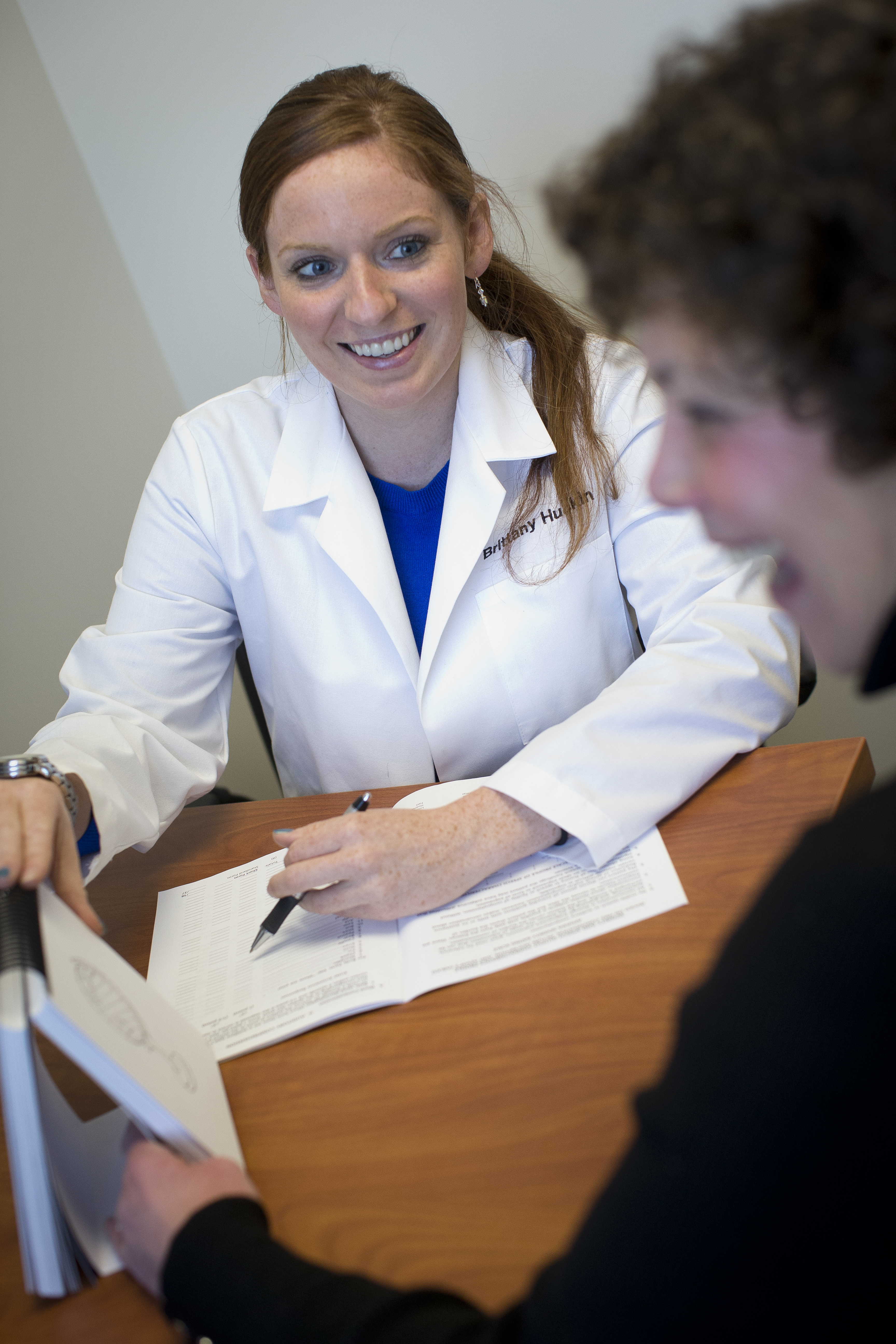 Clinician working with patient