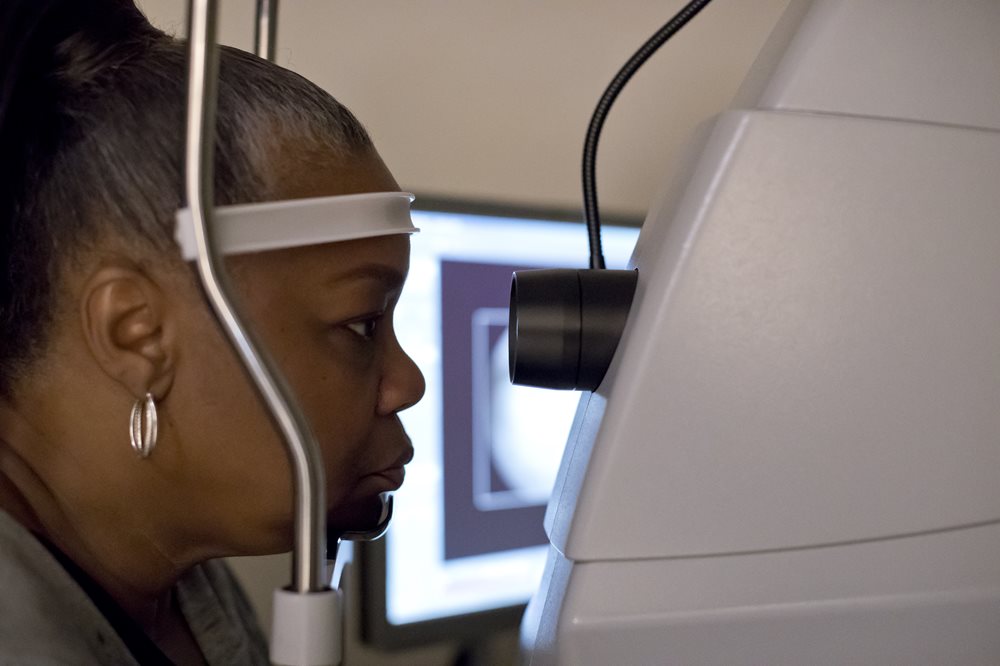 Woman having eye exam