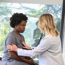 Woman having heart checked